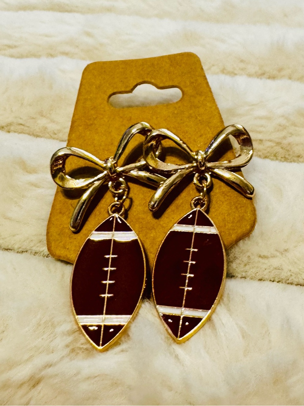 Gold Bow Drop Earrings with Brown Football Charms